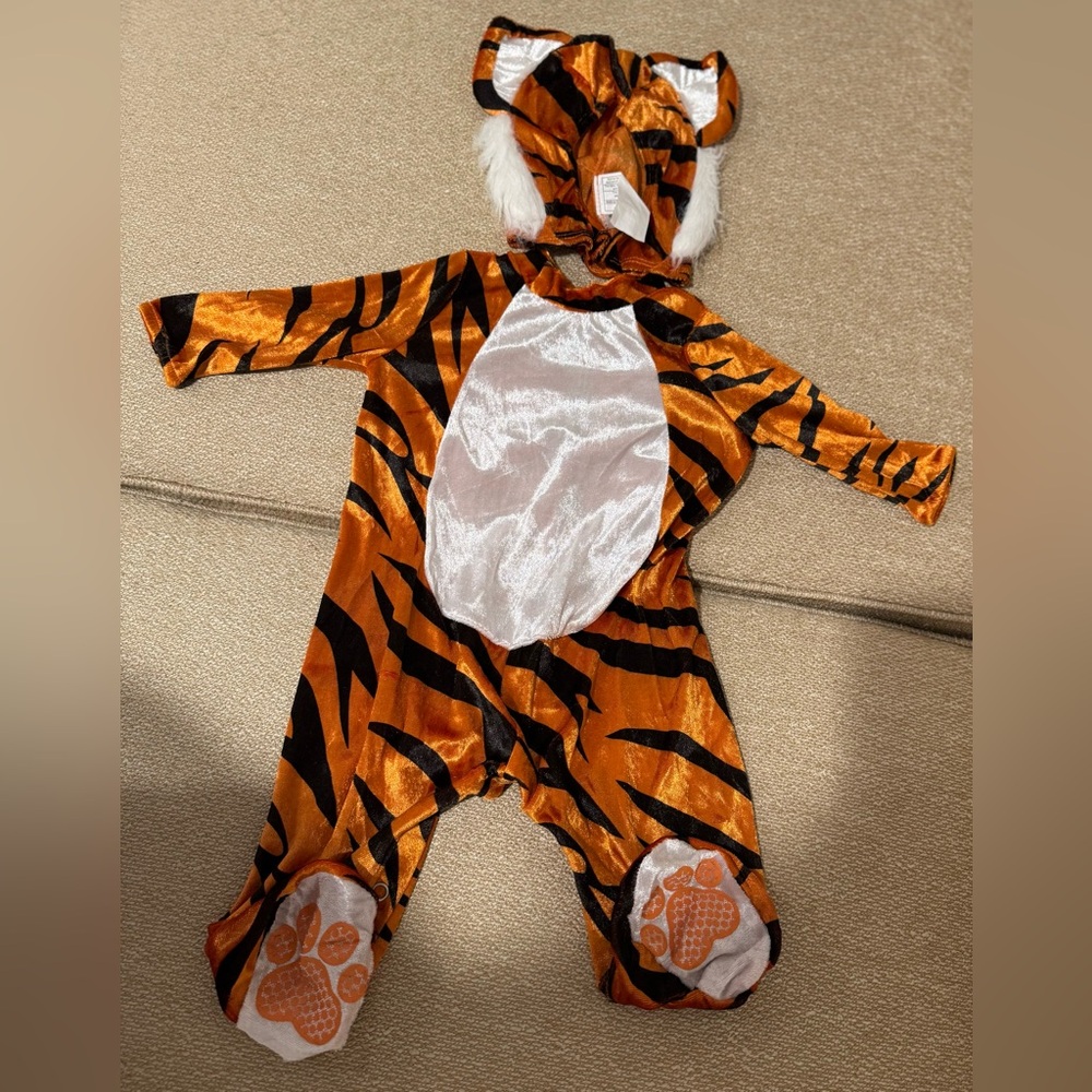 Spirit Halloween Infant Tiger Costume in Orange and Black perfect for Halloween!